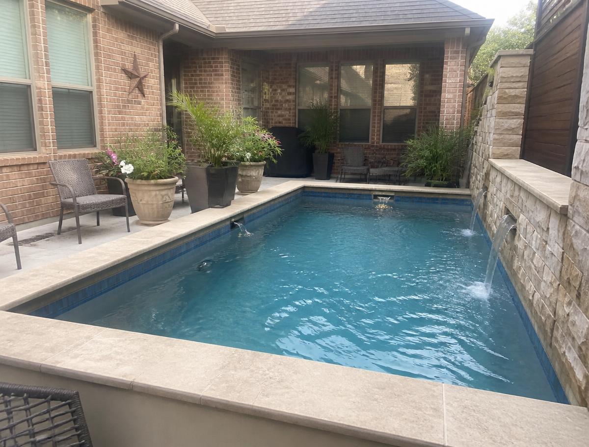 Compact courtyard pool at a Dallas brick home