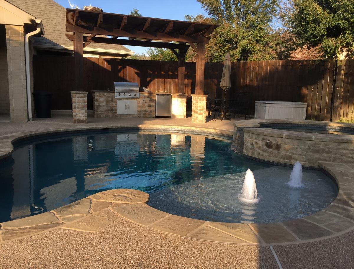 DFW backyard pool with spa and outdoor kitchen